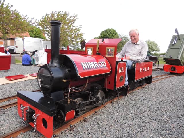 Robert Holland with his favourite steam locomtive on the Ropsley Heath Light Railway.