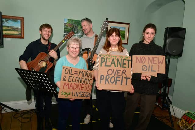 Campaigners at The Priory Hotel in Louth, learning a song 'A Message to you, Rishi'. Front left: Tamsin Hunkin, Amada Suddaby and Mathilda Dennis with musicians Brad and Jim.