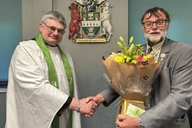 Coun Bunney was given a special pin for his time as chairman and presented with flowers as a thank you for his service