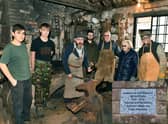 A group of the volunteers at Welbourn Forge - third from left is blacksmith, Carl Rear, second from right is Marion Goodhand. Photo: Mick Fox