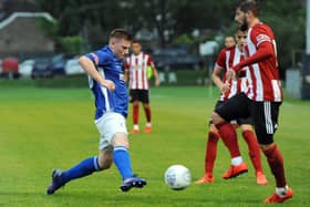 Andrew Wright (left) in action for Matlock Town against Sheffield United.