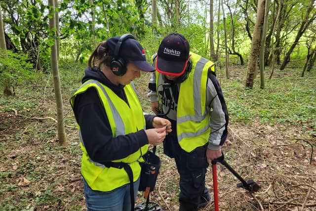 Detectorists checking out a find in Reeve's Plantation. Photo: RAF