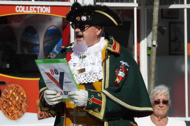 Sleaford Town Crier John Griffiths makes the proclamation for the VJ Day 80th anniversary.