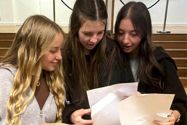 Lily Grace Horrey, Casey Robertson, and Roby Brewster from the Giles Academy.
