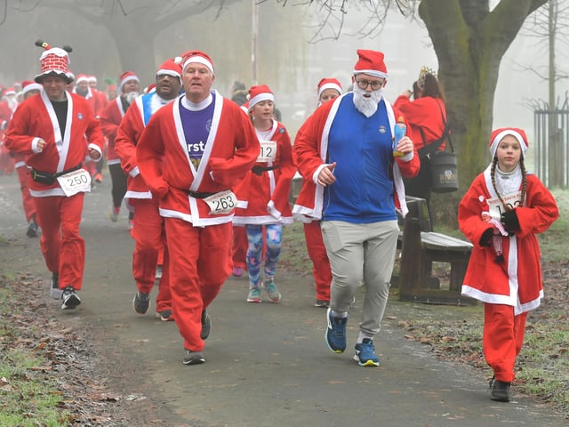 Action from this year's Boston Santa Run.