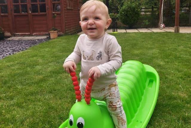Finley Baker, playing in the garden. Family photo, via Lincolnshire Police