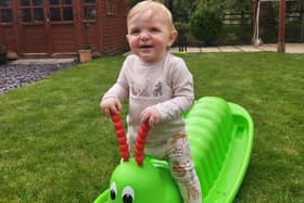 Finley Baker, playing in the garden. Family photo, via Lincolnshire Police