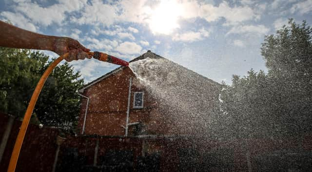 Hosepipe attached to a water tap. The North West Region of England is to be hit with a hosepipe ban next month due to the recent heatwave the highest on record for the time of year.