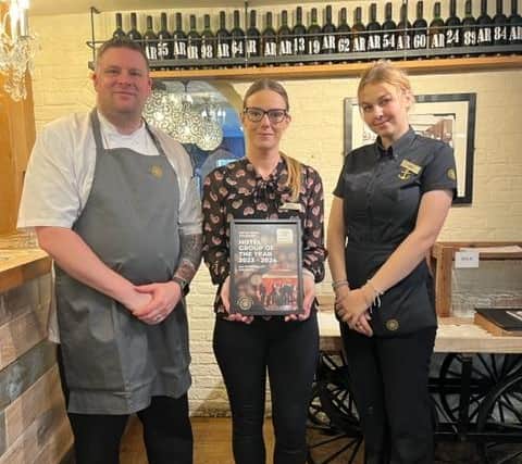 Admiral Rodney's General Manager, Hannah Milton (centre) with Head Chef, Lee Hall (left) and front of house team member, Milly Roberts (right). Photo: Coaching Inn Group