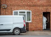 Forensic investigators at the scene of the double deaths in George  Street, Sleaford.