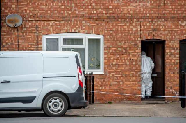 Forensic investigators at the scene of the double deaths in George  Street, Sleaford.