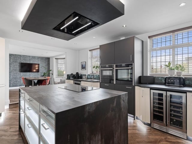 Another angle on the kitchen, with the breakfast room in the distance.