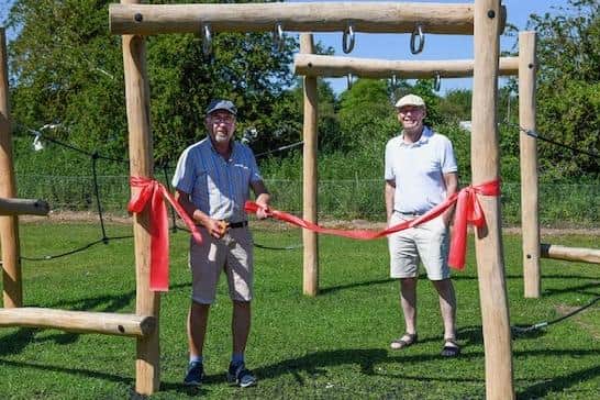 The ribbon-cutting ceremony in Kirkby on Bain, performed by popular village veteran Bob Pinning, alongside Coun Martin Briscombe, chairman of the parish council.