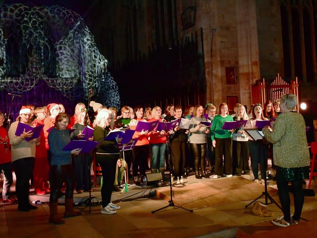 Beona Community Choir performing in Boston Stump.