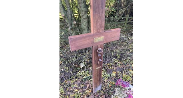 The cross which has been taken from the crash site