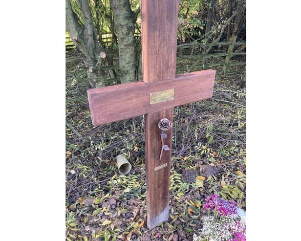The cross which has been taken from the crash site