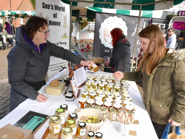 Sue Heron of Sue's World of Honey, Hainton, with Trey Brinklow of Market Rasen. Photo: David Dawson