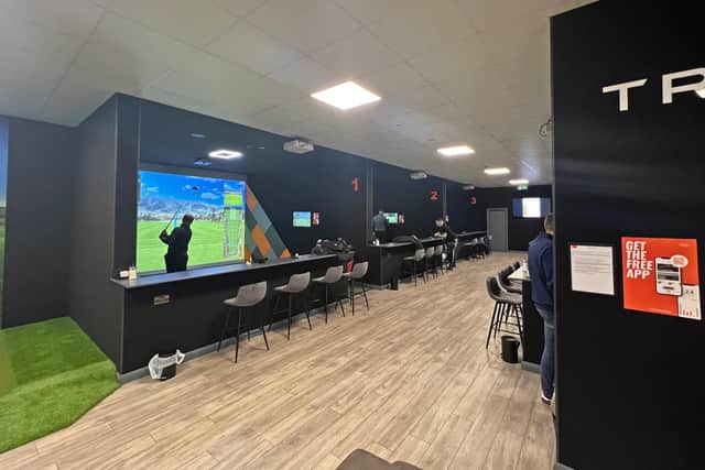 Inside Golf Haven, Boston.