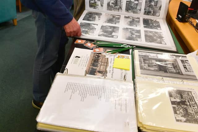 Michael Gill of High Toynton, looking at archive material from Horncastle History and Heritage Society.