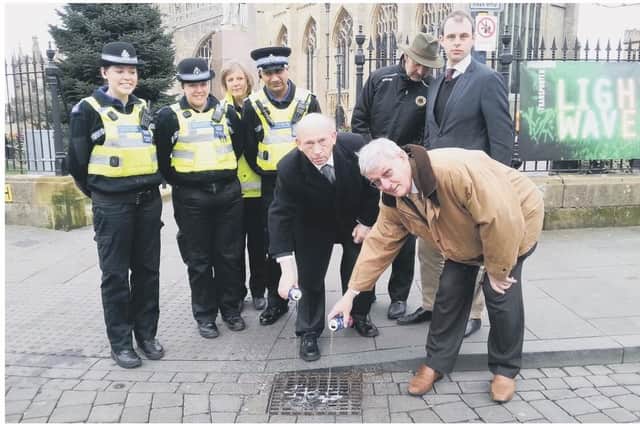 An image we took back in 2015 when the street drinking ban was first introduced. Pictured are borough councillors at the time, along with police and MP Matt Warman. Photo: Gemma Gadd