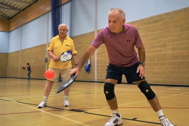 Players enjoying Pickleball.