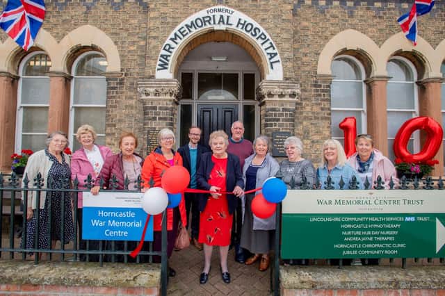 Sister Lovely opens Horncastle War Memorial Hospital's 100th anniversary event with chairman of Horncastle History and Heritage Society Dr Ian Marshman and WMC chairman Julian Millington. Photo: John Aron Photography