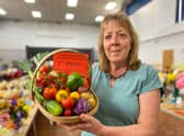 Kathy Breton with her basket which won 1st Prize for Mixed Garden Vegetables.