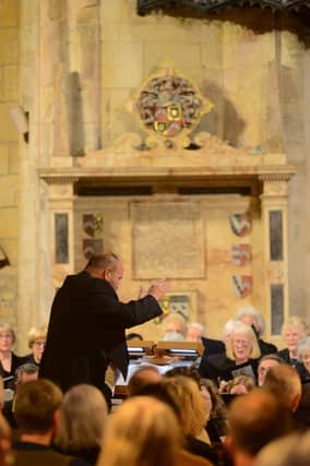 Choir with conductor, Rowland Lee