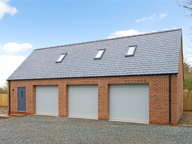 The triple garage.