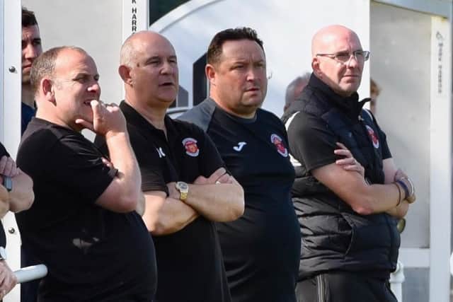 Chris Rawlinson (centre) has overseen four league wins in a row.