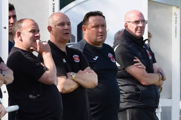 Chris Rawlinson (centre) has overseen four league wins in a row.