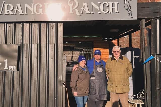 Coun Peter Bedford with staff at The Wrangle Ranch.