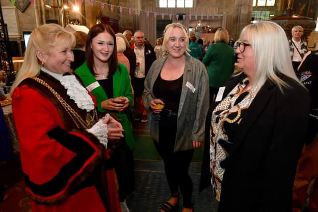 Coun Dorrian talking with Romany-Dee Bills, Carrie Bills and Patsie Marson of Community Support Group.