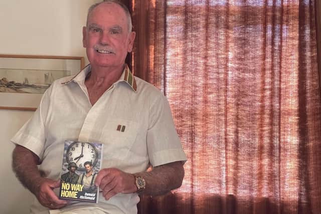 Author and retired schoolteacher Donald McDonald with his latest novel, 'No Way Home'.