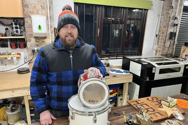 Paul Bushell of Bushkraft with the drum that will be upcycled into a clock.