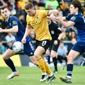 Boston United stayed in the play-off hunt with a draw at home to Scarborough.