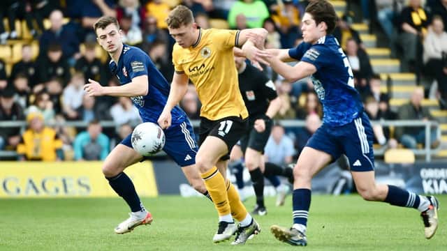 Boston United stayed in the play-off hunt with a draw at home to Scarborough.