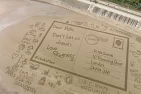A drone image of the 'Postcard from the Edge' to the Prime Minister, which was created on Skegness beach.