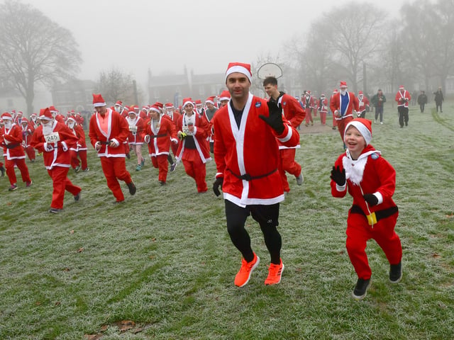 The Santas set off on their 5K run from Central Park.