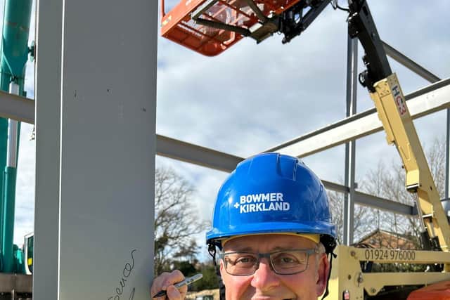 Dr Spencer signing the steel
