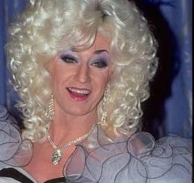 Paul O'Grady dressed as his drag queen alter ago Lily Savage at the National Television Awards at the Royal Albert Hall in London on October 8, 1997.