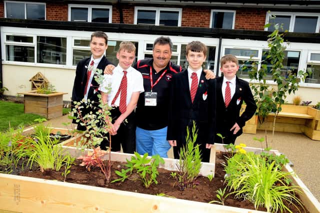 Kirton Lindsey builder Dave Capell, who helped transform the space, with Huntcliff School students