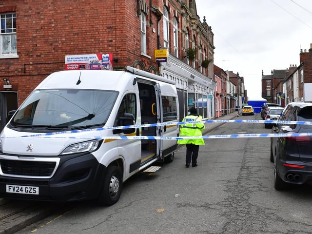 Officers remain on the scene at Union Street, Market Rasen. Photo: David Dawson