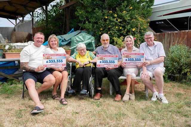 From left, Wayne, Teresa, June, Mike, Rebecca and David celebrate the combined £1m win.