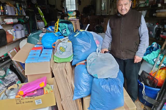 Terry Rumble taking another delivery into storage ahead of his trip to Ukraine this month, weather permitting.