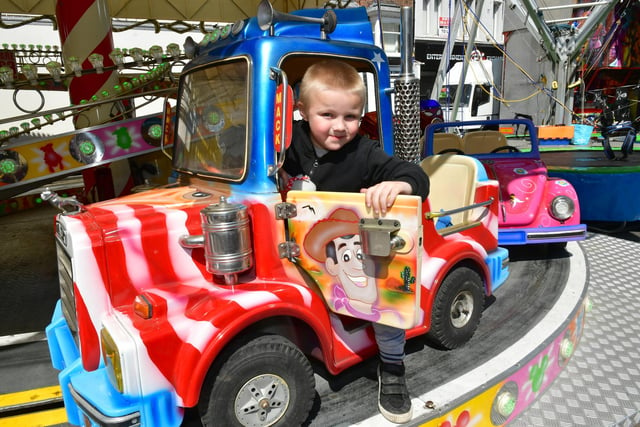 Riley Haigh, aged 6, of Boston, enjoys one of the rides.