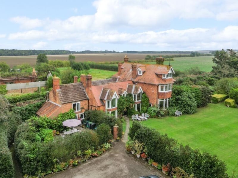 Another aerial view of the home and its grounds.