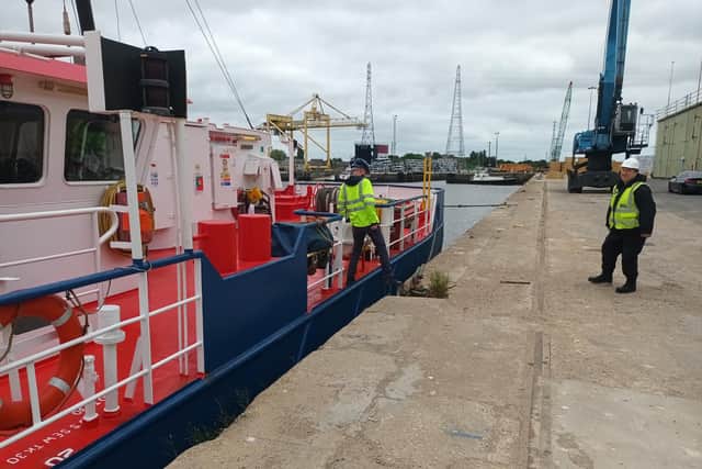 Officers boarding a vessel at the Port of Boston.