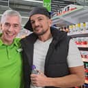Asda community champion Stephen Bromby with popstar Peter Andre on the Rollback dance video shoot.