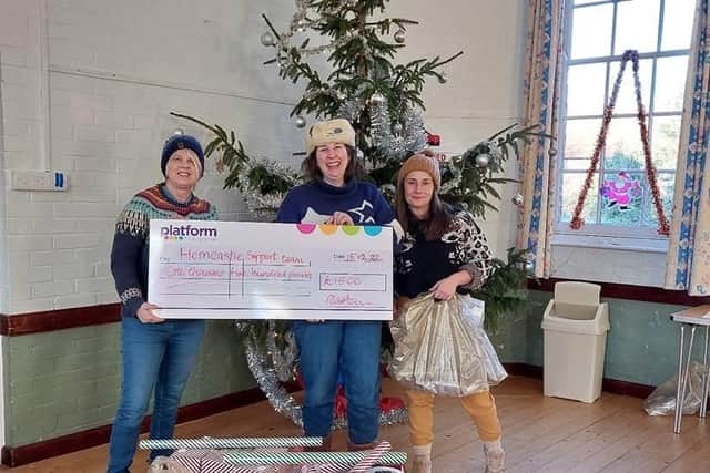 Platform’s Community Engagement Officer, Deborah Green (left) is pictured presenting the £1,500 cheque to Isabel Forrester (centre) and Nancy Sorenti (right) from Horncastle Support Team.